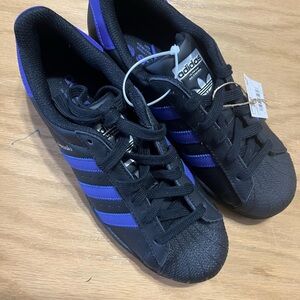 Adidas women’s Black and Purple Sneakers